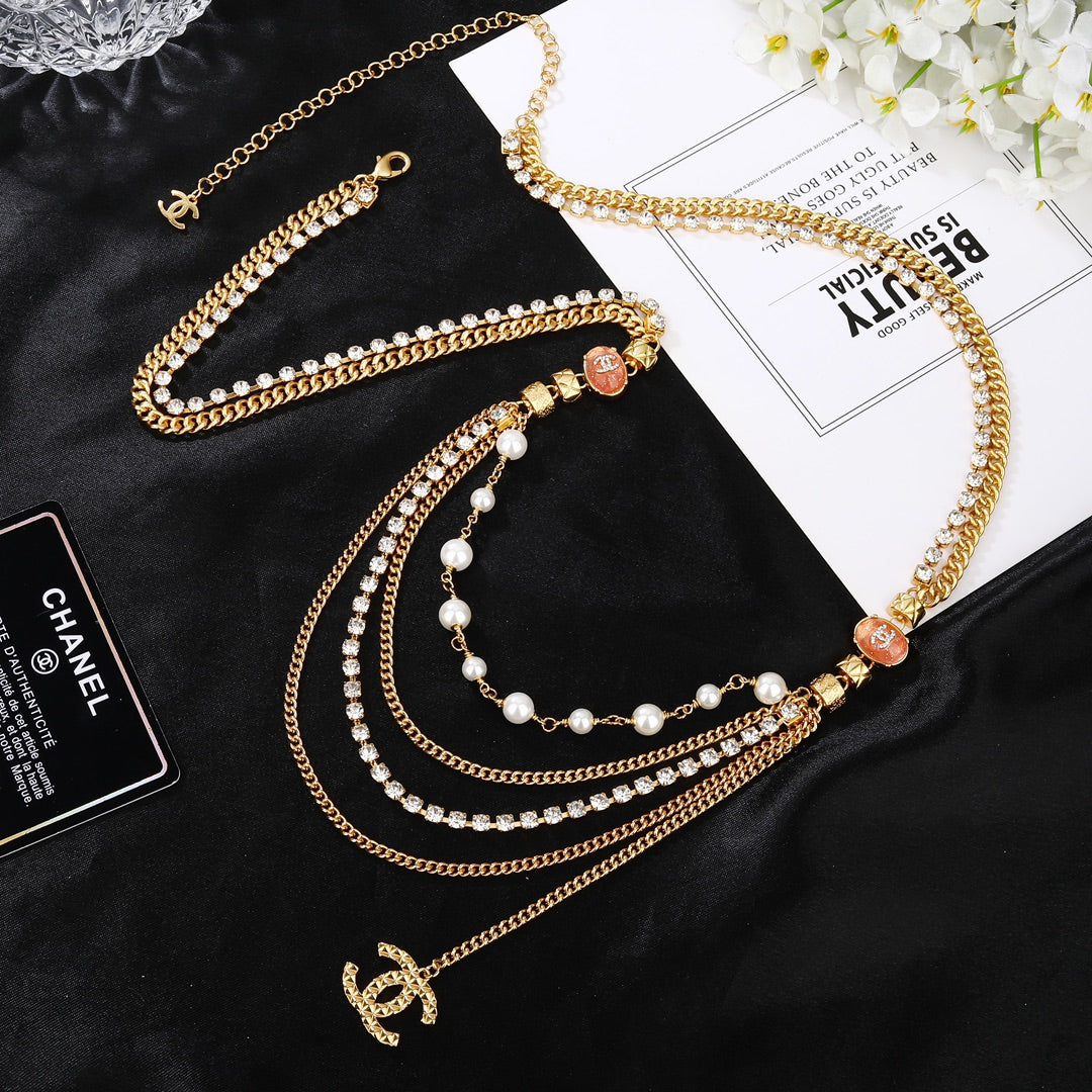 CHANEL 25S GOLD CHAIN BELT WITH PEARL 611794